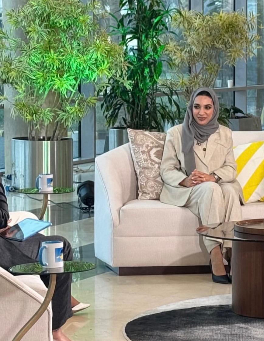 Shaikha participating in a television media interview in Kuwait