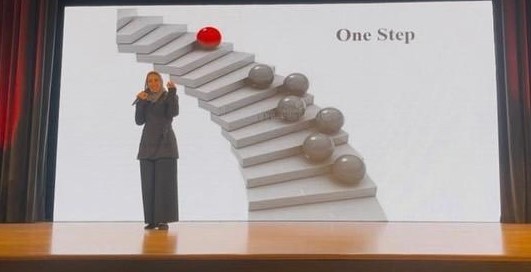 Shaikha delivering the One Step motivational speech